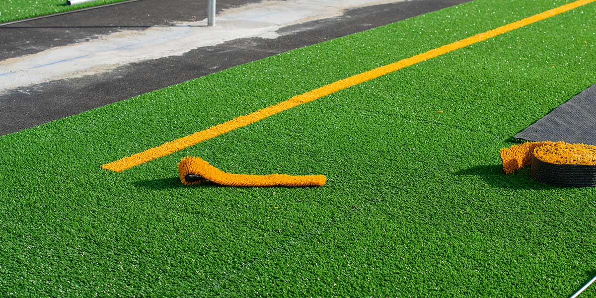 artificial-grass-installation-for-football-fields